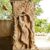 Close view showing female figure holding tree, Ramappa temple